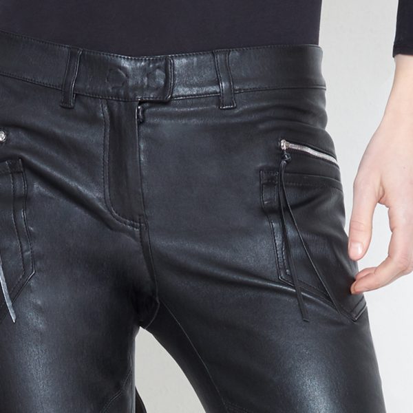 Detail of black stretch leather pants