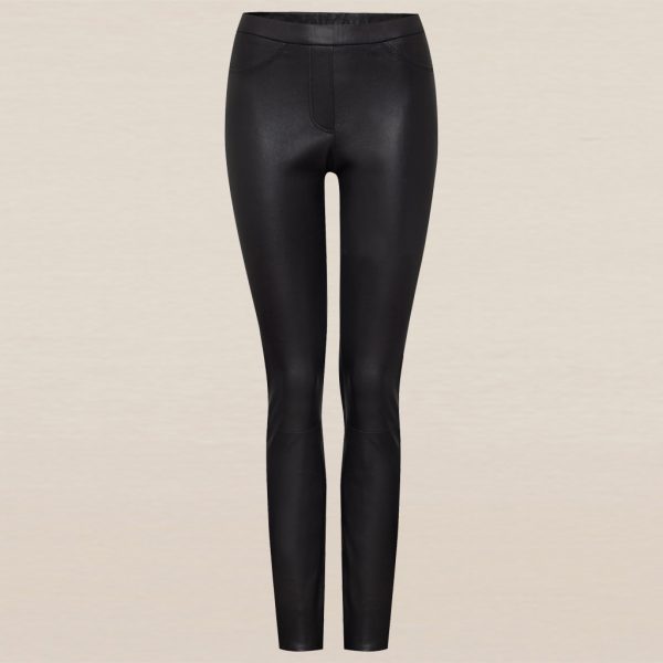 Cropped black stretch leather leggings by Ayasse against a beige background