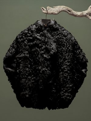 Cocoon Lammfellcape Black