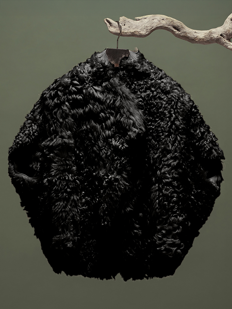 Cocoon Lammfellcape Black